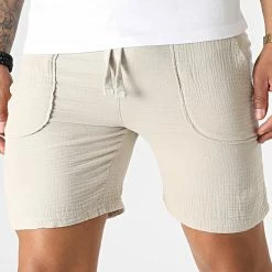 De gros 🥰 Short Jogging P70 Beige de Uniplay ⭐
