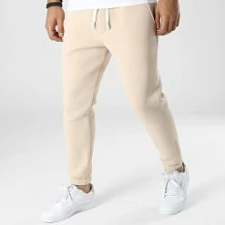 Budget ✔️ Pantalon Jogging UPP76 Beige de Uniplay 🌟