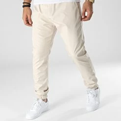 Sortie 🔥 Jogger Pant OTB-7 Beige de Uniplay 🤩